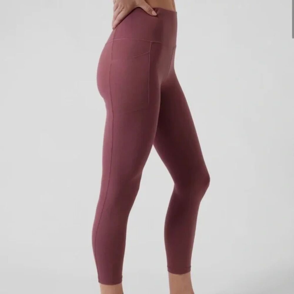 ATHLETA TAWNY ROSE SALUTATION STASH POCKET ll 7/8 EUC  Size Small